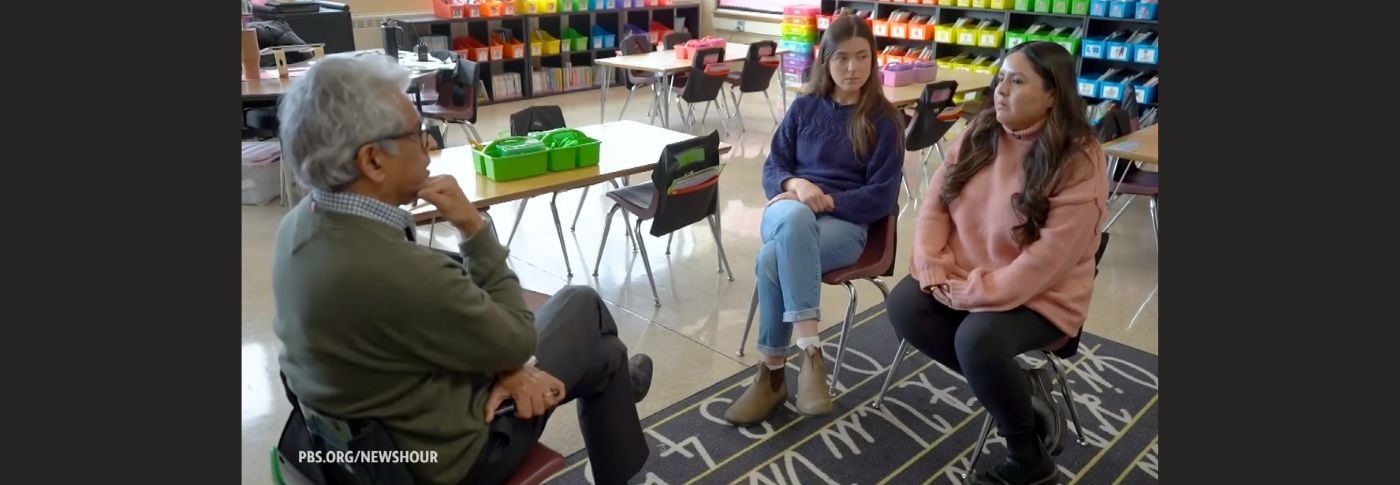 An reporter speaks with two educators in a Minnesota classroom as schools navigate the impact of a federal immigration crackdown on students and families.