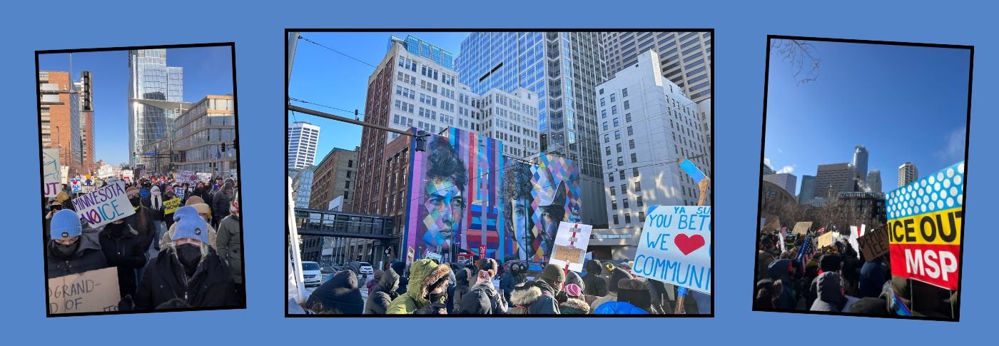 Protesters gathered in downtown Minneapolis holding signs about immigration enforcement and community solidarity.
